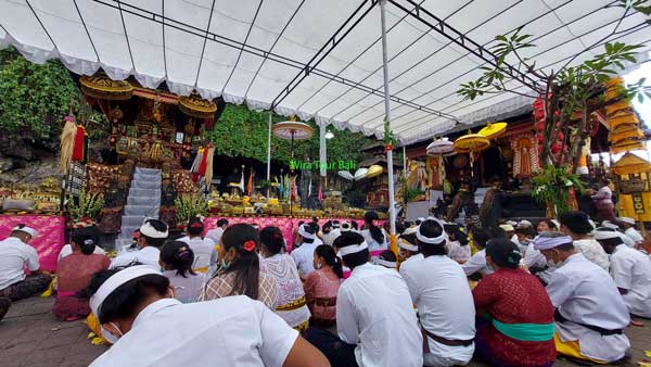 Balinese Hindu Praying At Goa Lawah Temple