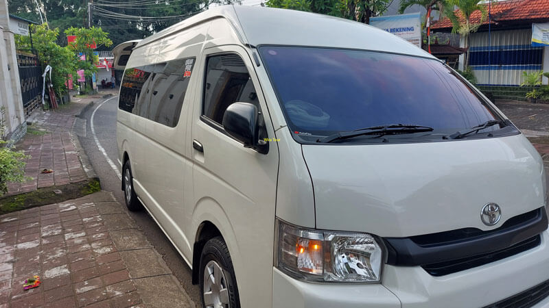 Is it better to rent a car or hire a driver in Bali?