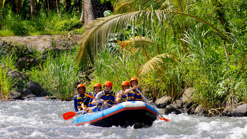 River rafters in Bali gaining Vitamin D from sunshine. Health Benefits of River Rafting in Bali