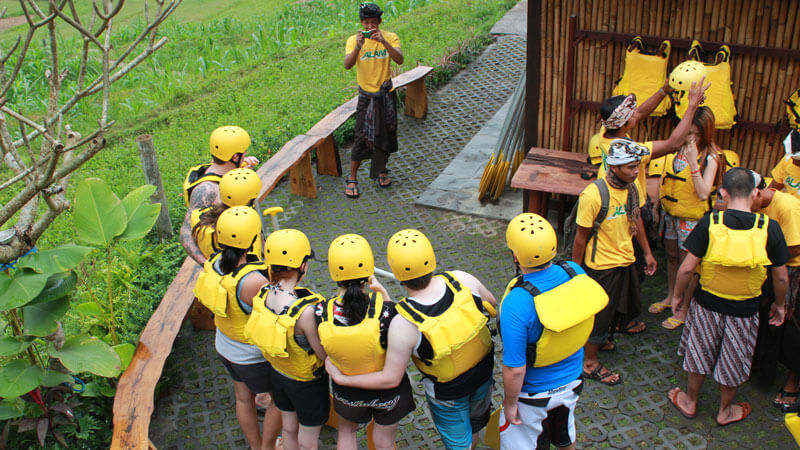 Beginner rafters receiving a safety briefing in Bali
