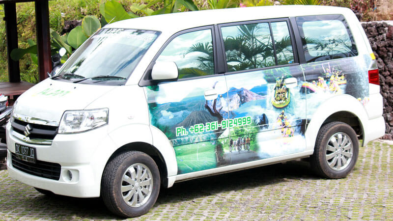 Branded rafting shuttle van ready for hotel pick-up service in Bali