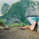 Romantic view at Kelingking Beach, Nusa Penida during Bali honeymoon.