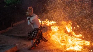 Hanoman character performing Kecak Fire Dance at Uluwatu Temple, Bali