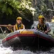 Two travelers rafting calmly through Bali’s Ayung River jungle