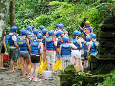 Sobek Ayung rafting group in full gear during pre-trip safety briefing in jungle setting