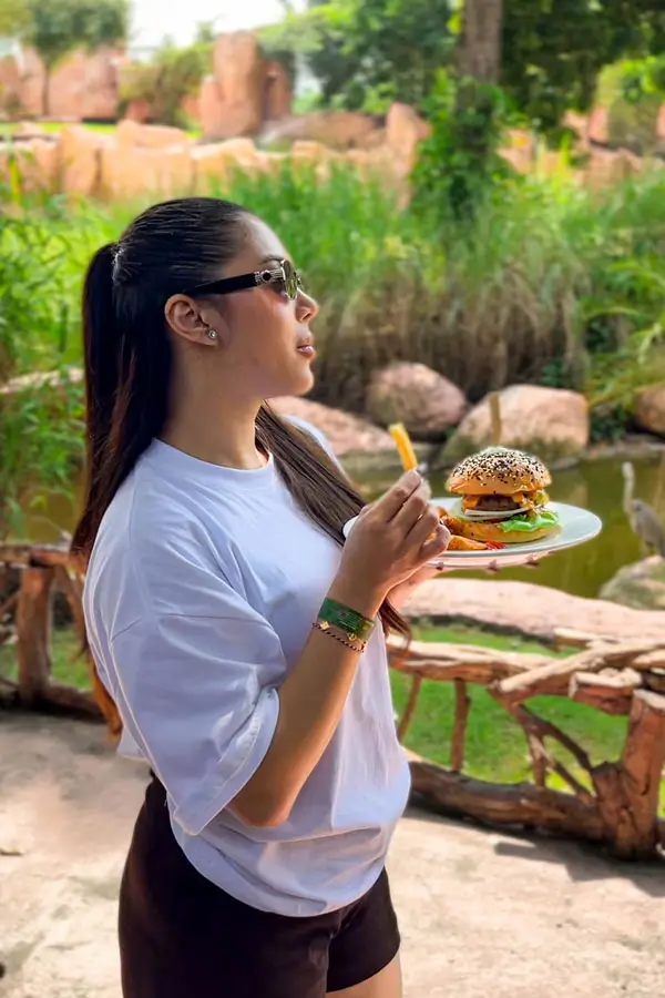 International tourist enjoying lunch at Bali Zoo with Zoo Explorer ticket