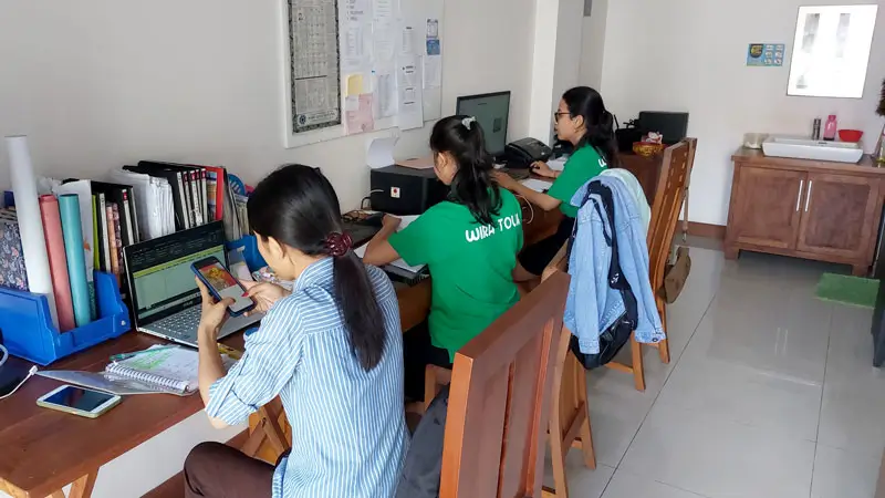 Wira Tour Bali team offering WhatsApp support for Ayung rafting booking