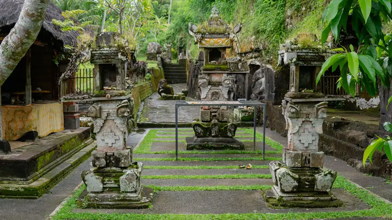 Sacred courtyard with stone altars and temple elements at Yeh Pulu heritage site