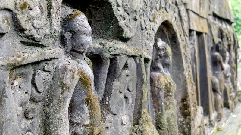 Morning view of ancient cliff carvings at Yeh Pulu Temple Ubud