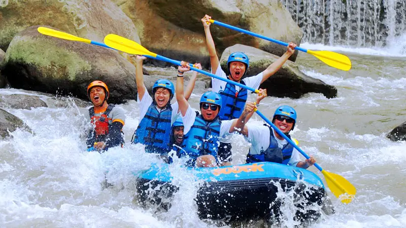 Guests enjoy light rapids with Sobek Rafting on Ayung River, Bali