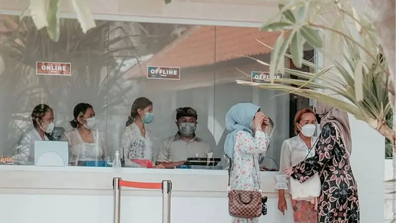 Kecak ticket counter at Melasti Beach for voucher redemption near the amphitheater steps