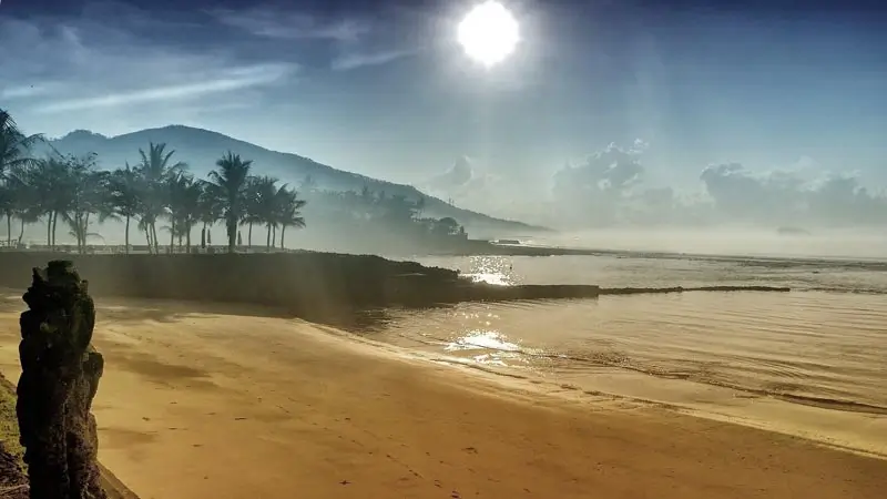 Quiet sandy beach in Candidasa Karangasem in soft morning light