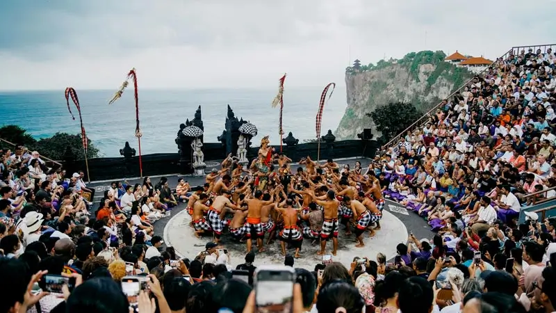 Uluwatu Kecak tickets: crowd at cliff amphitheater; today 18:00 or 19:00 (WITA)