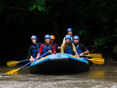 First-timers river rafting in Bali with helmets, life jackets, and guide support