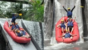 Participants passing the BMW Rafting dam drop