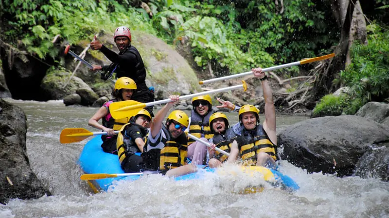 Raft team on a rapid during Graha Adventure Rafting Ubud