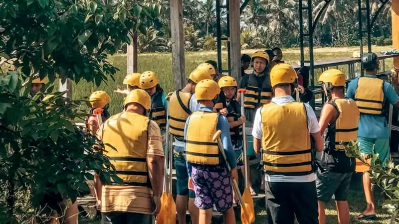 Guests join a rafting briefing before Graha Adventure Rafting Ubud