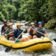 Group rafting on a tropical Bali river in practical quick-dry clothing