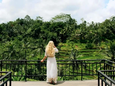Traveler overlooking rice terraces from a viewpoint near Ubud