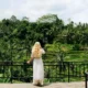 Traveler overlooking rice terraces from a viewpoint near Ubud