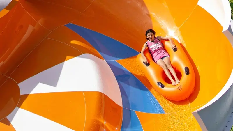 Child riding a waterslide at Waterbom Bali