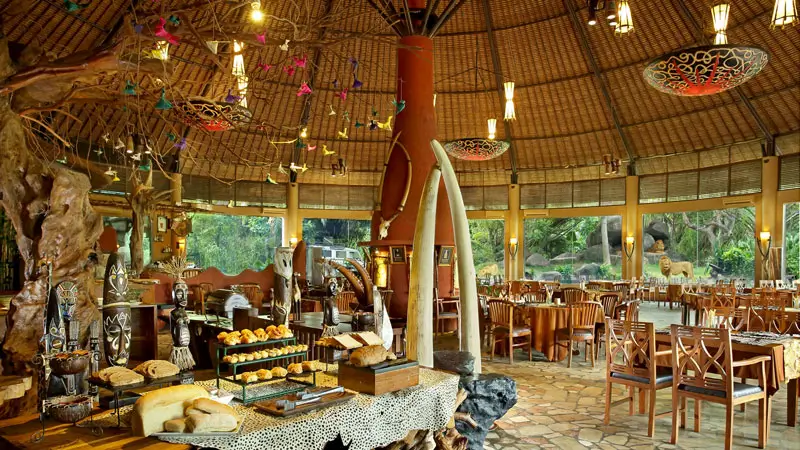 Restaurant seating area prepared for a family lunch break at Bali Safari