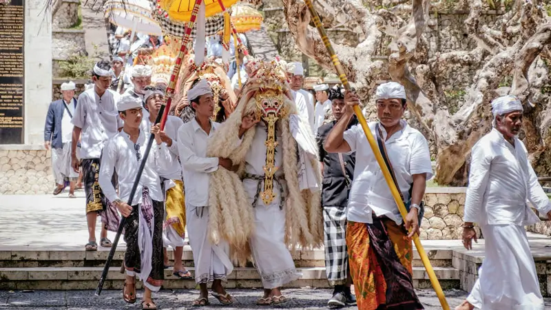 Balinese ceremony procession in a sacred courtyard