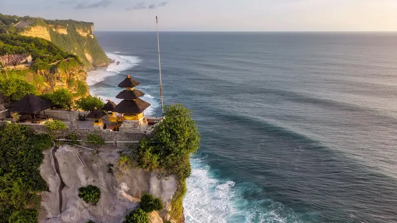Uluwatu Temple sits above cliffs and open ocean