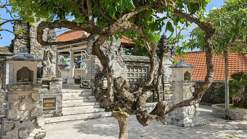 Stone gate leading to a restricted prayer area