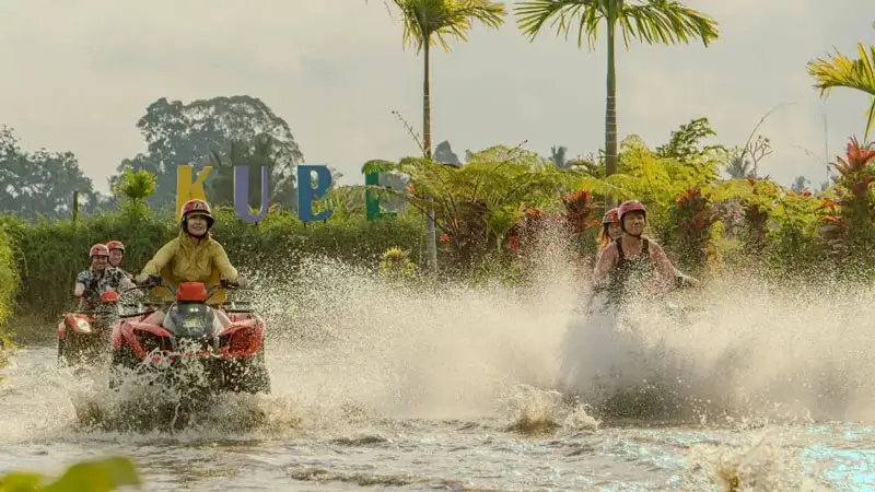 Guests crossing a wet track section during the ride